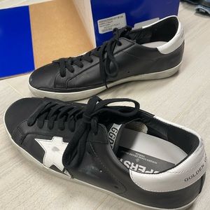 Golden goose superstar sneakers black and white